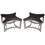 A Pair of "X" Shaped Steel Framed Ottomans