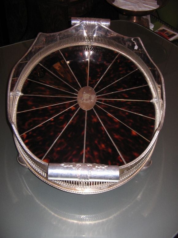 A Silver and Tortoise Shell Oval Shaped Tray
