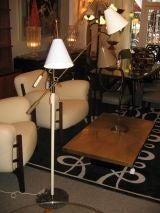 A Triannale Floorlamp with a Marble Base