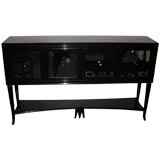 A Four Door Art Deco Credenza in Black Lacquer and Mirror