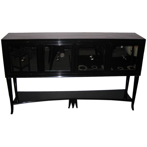 A Four Door Art Deco Credenza in Black Lacquer and Mirror
