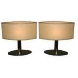 A Pair of Glass Based Table Lamps with Whip Stitched Shades