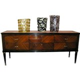 A Six Drawer Credenza in Rosewood with an Amber Mirrored Top