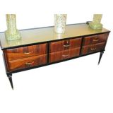 A Six Drawer Low Credenza in Rosewood with a Glass Top