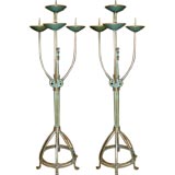 A Pair of Bronze and Brass Four Arm Large Scale Candle Holders