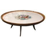 A Large Round Lacquered Cocktail Table by Albert Saverys