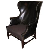 A Modernist Leather Winged Back Chair