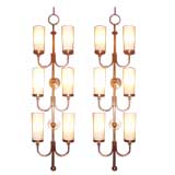 A Pair of Monumental Brass Six Light Wall Sconces