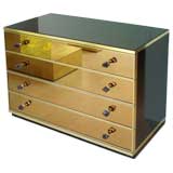 A Stunning Pair of Gold Mirror Front Commodes