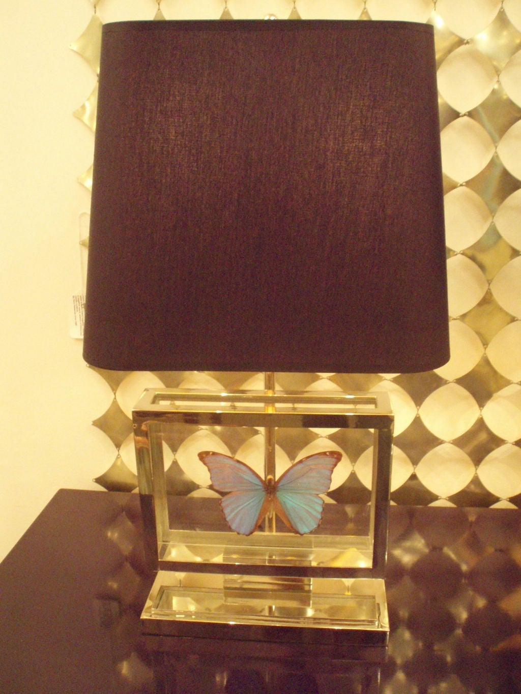 A Pair of Nickled Table Lamps with Butterfly's Under Glass