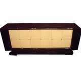 An Art Deco Sideboard in Black Lacquer and White Leather