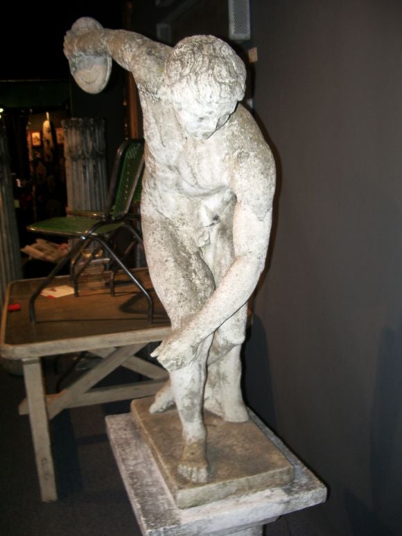 Stone statue on plinth