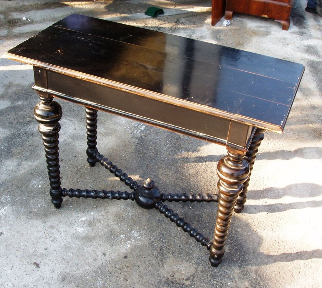 Black ebony side table. Spool legs. Decorative center finial.