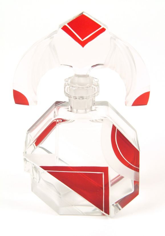 clear glass with red abstract design; geometric cutting and evident playfulness with planes are strongly suggestive of Cubist and Constructivist influences then in vogue in Czechoslovakia