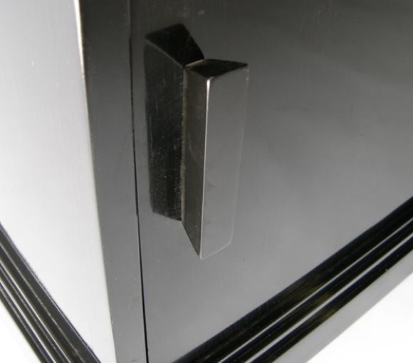 Mid-20th Century Skyscraper Cabinet in the style of Paul Frankl