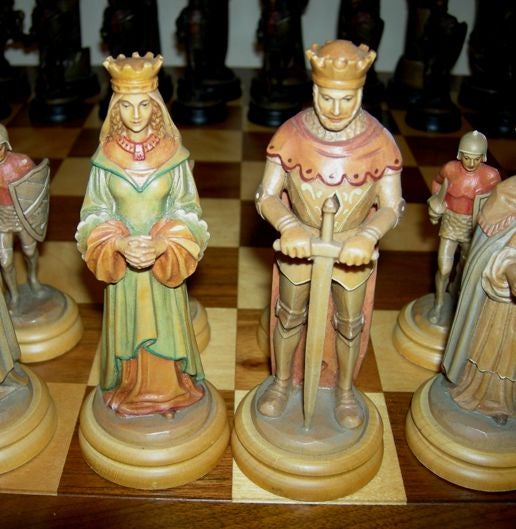 This wonderful hand carved and painted set is of the highest quality, and is in beautiful condition. It was made by Anri of Italy in the 1970's, and referred to as the Monsalvat set. The players fit into the original hardwood case, and includes the