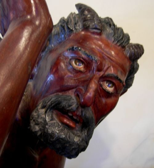 Rising out of the flames comes Satan himself, in all his evil glory! This fantastic rendition has great old paint and a hell of a lot of character. He is all hand carved in sections, joined and painted. There are a number of surface variations, as