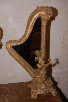 1920's Resin Harp Shaped Mirror With Cherub ( two available )
