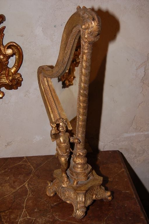 French 1920's Resin Harp Shaped Mirror With Cherub ( two available )