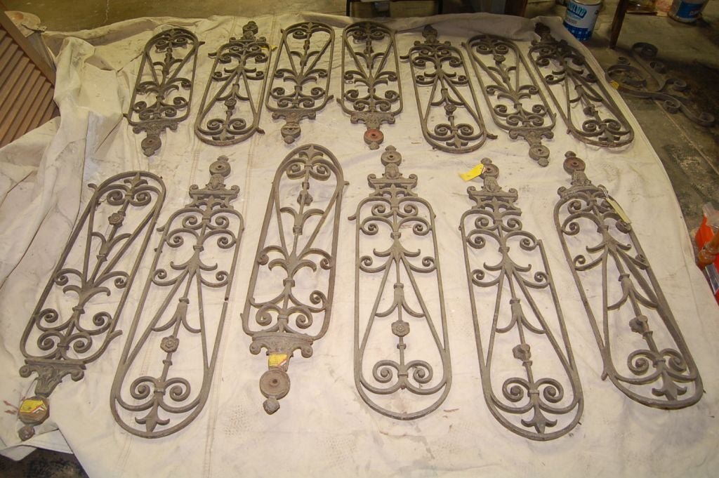 13 Parts of a 19th Century stair railing<br />
11 pieces at 45.5''h x 10.75''w x 1''d<br />
2 pieces at 45.5''h x 10.75''w x 3''d (concaved)