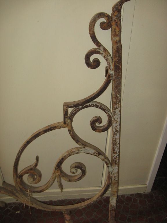 Early 19th century balcony supports, hand-wrought iron.
Measures: 49'' H x 32'' W (each piece).
(Also: balconies, grille, railing).