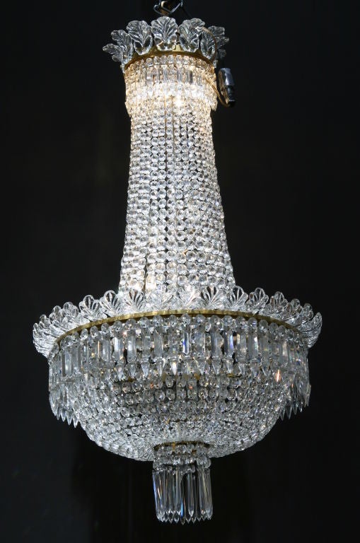 1950s French Beaded Baccarat Chandelier.
Approximately 39'' H X 20'' D.