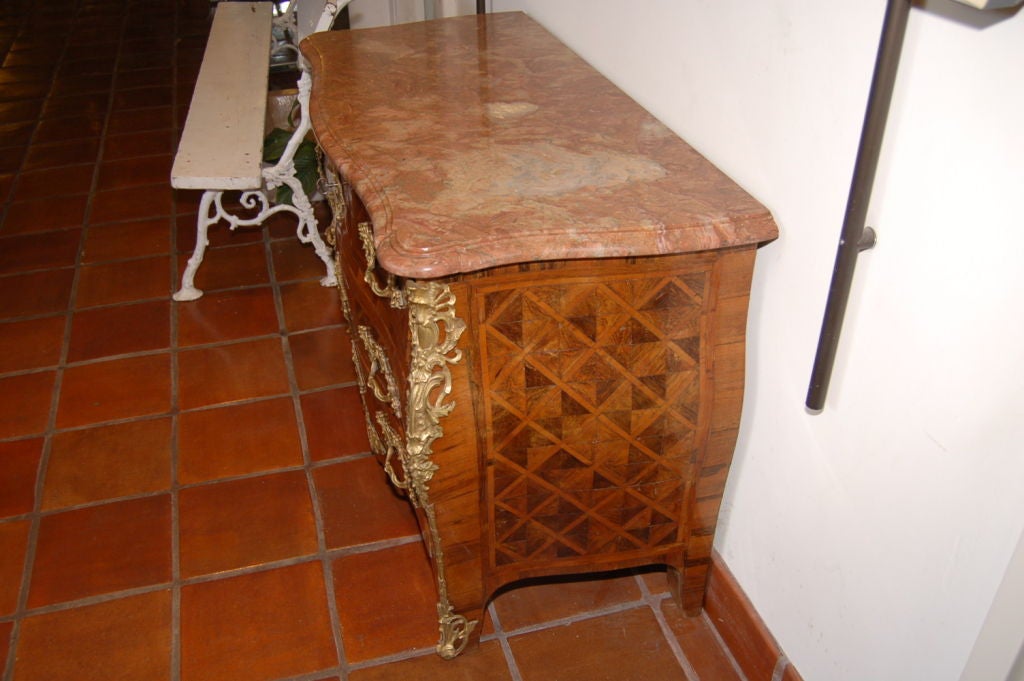 18th century exquisite parquetry commode with original marble and bronze doré hardware and ormolu mounted
Measures: 52 H x 23.5 D x 34 H.
(Also: chest of drawers, dresser three drawer chest, cabinet)