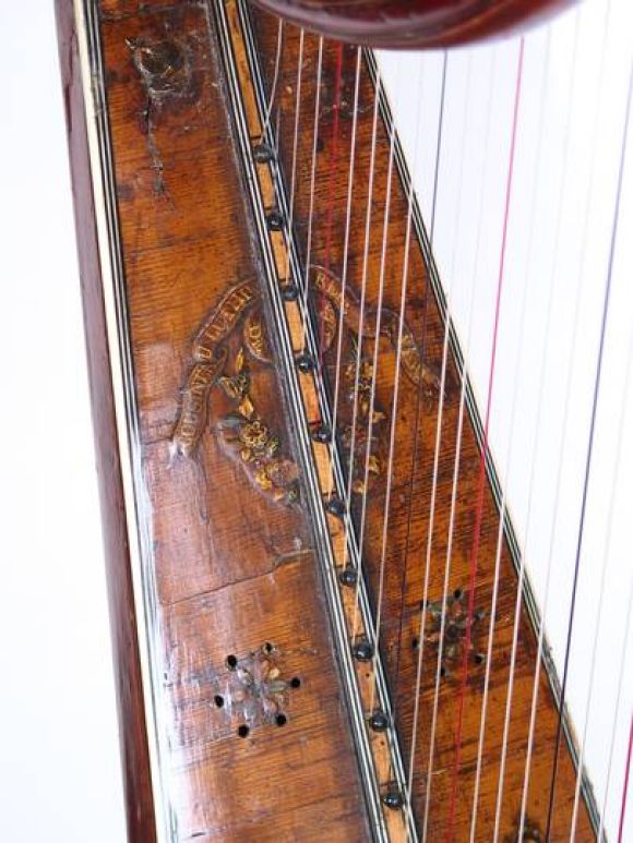 Louis XVI harp, of the period, signed by Paris master harp maker, Couisineau. Superb chinoiserie with gilding. Single action with crochet mechanism (Invented by Cousineau). Measures: 65'' H X 18'''W X 32''D. (musical instrument).