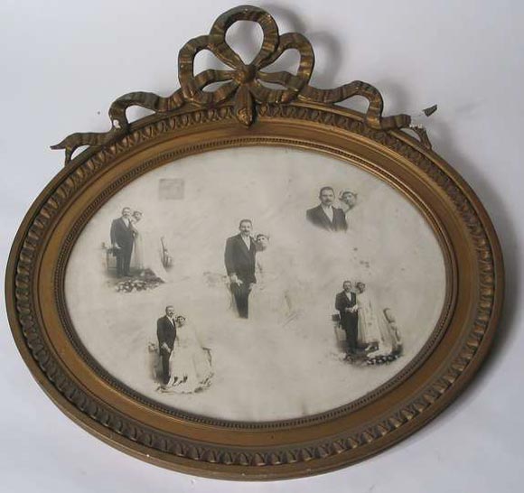 1920s French frame gesso over wood gold doré́' with bow 30'' W X 32'' H.