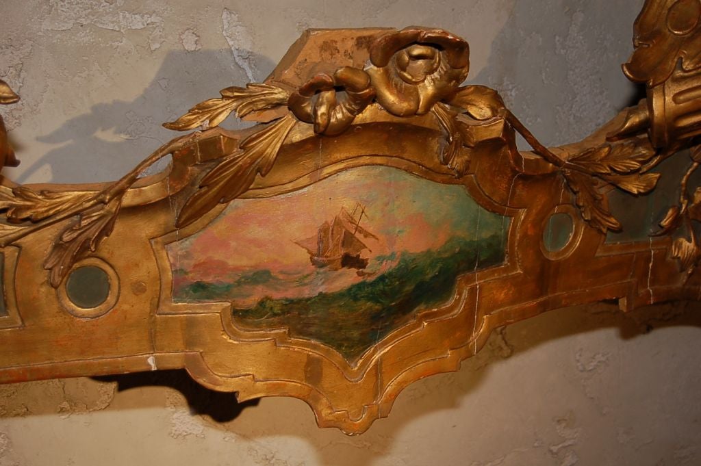 Late 18th century venetian canopy carved wood with painted scene
(similar one available - #6361) also corona.
Measures: 57.5” W X 17” H X 14” d.