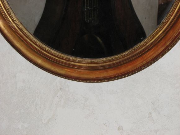 Louis XV 19th Century French Gold Doré Mirror with Carved Bow