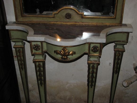 18th century console and mirror museum quality.
Console measures: 39.5'' W x 37'' H x 15.5'' D. Mirror measures: 38'' W x 56'' H.
Console has marble top framed with white marble a nice feature
original mirror. 