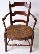 End of 18th C. / Early 19th C. French Walnut Rush Seat Arm Chair