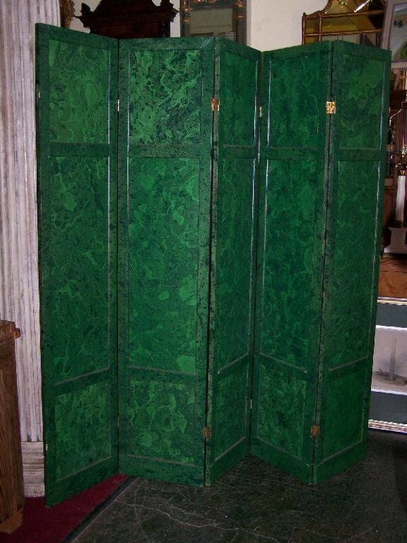 A fabulously realistic malachite hand painted screen with six double hinged folding panels.  American, Circa 1980.  Backside is painted black.
In very good condition.