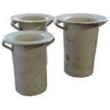 Three Italian glazed jars.