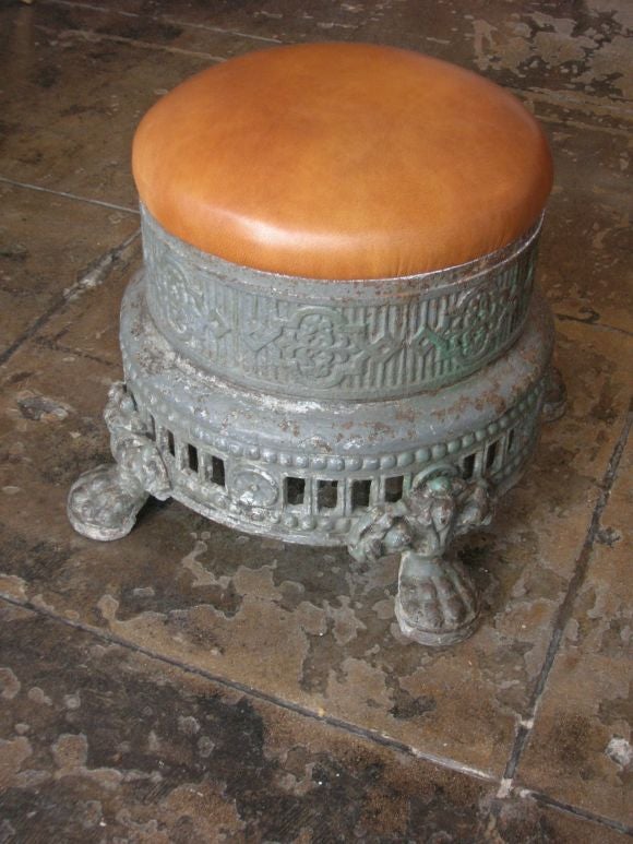 Cast iron stool with newly re-upholstered leather top seat