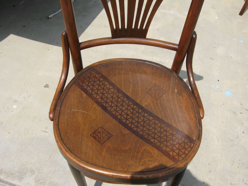 Bent Wood Set of 4 chairs with inlaid seats.