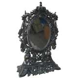 Venetian cast aluminum mirror