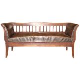 Walnut settee with original leather and nails