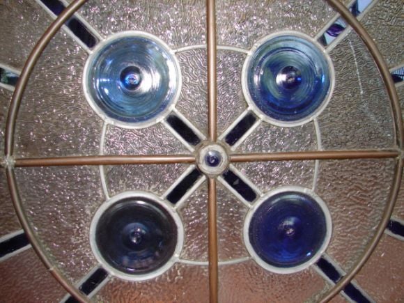 Round copper and glass paneled window