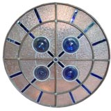 Round copper and glass paneled window