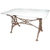Marble top table with cast iron base
