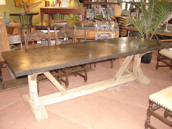 Gorgeous dining table with French white oak base with 2.25 inch thick Belgian bluestone top.