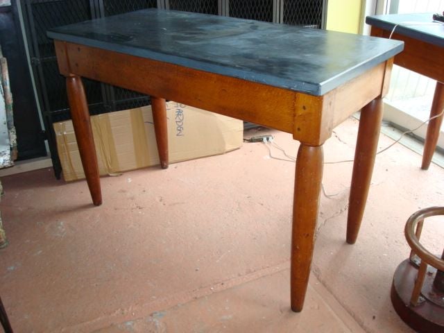 PAIR of fruitwood and black marble tables