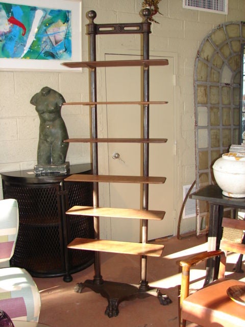 PAIR of cast iron lion's foot etageres