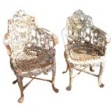 Pair of 19th c. cast iron armchairs by Robert Woods