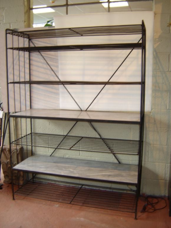 6-shelf iron Baker's rack with two marble shelves.