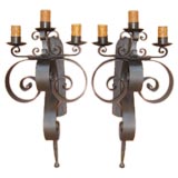Pair of large iron scroll wall sconces