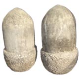 Pair of stone acorns