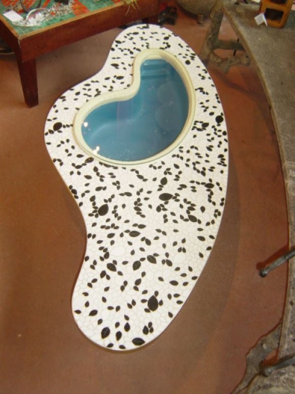 Fabulous free form coffee table with black and white leaf mosaic top, brushed brass rim and legs. Removable pool insert has glass top.